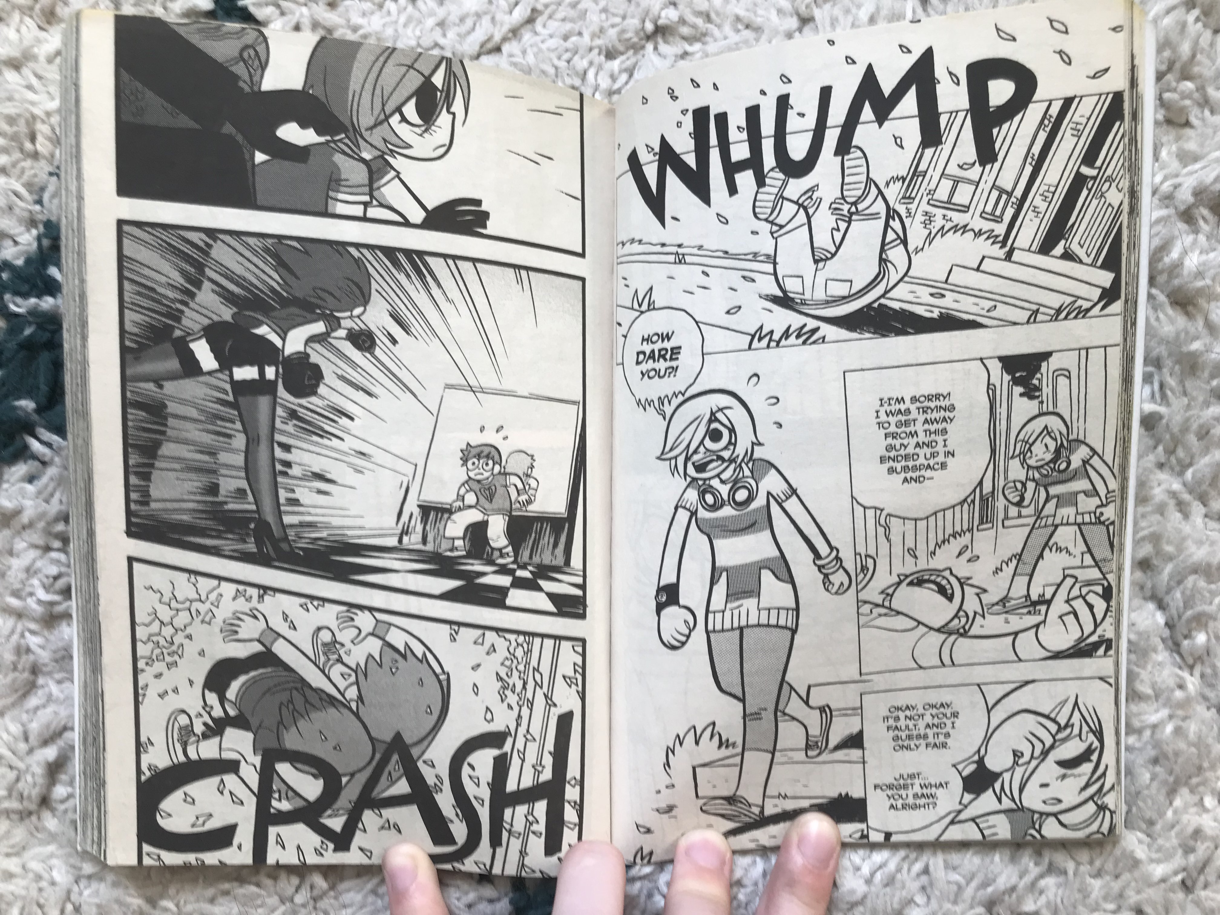 A photo of two pages from the Scott Pilgrim comic books, showing a less condensed panel layout for a slower pace 