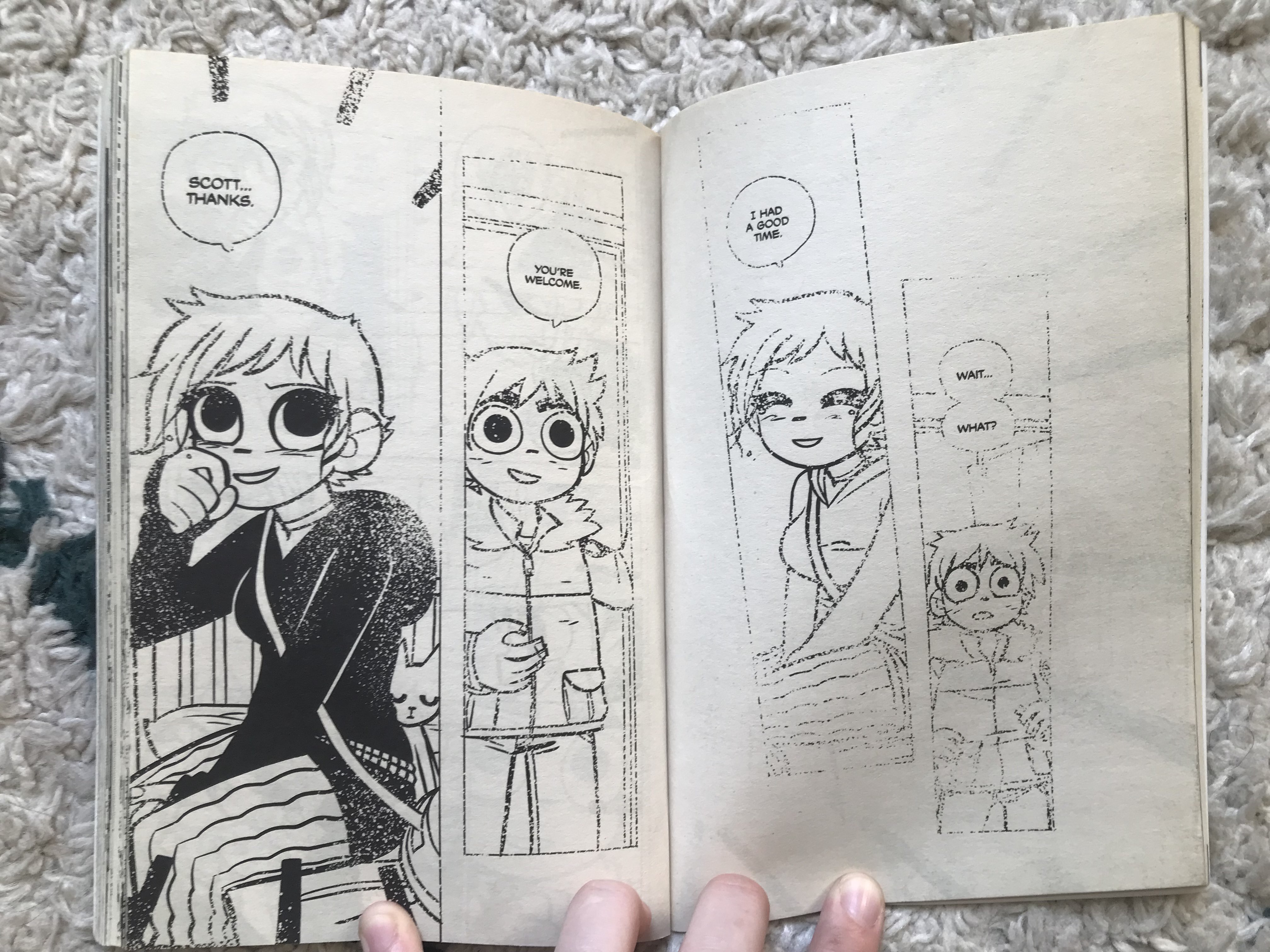 A photo of two pages from Scott PIlgrim, showing Scott arriving home to see Ramona has cut her hair, and is fading away into the white background, destroying the panels. 